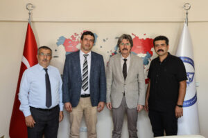 TÜDAM’da bayrak değişimi